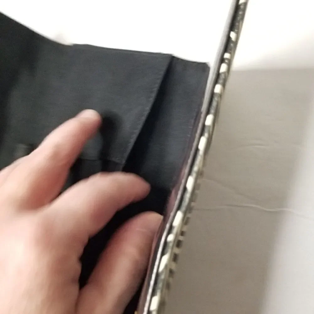 Fossil animal print wallet multiple pockets black interior
